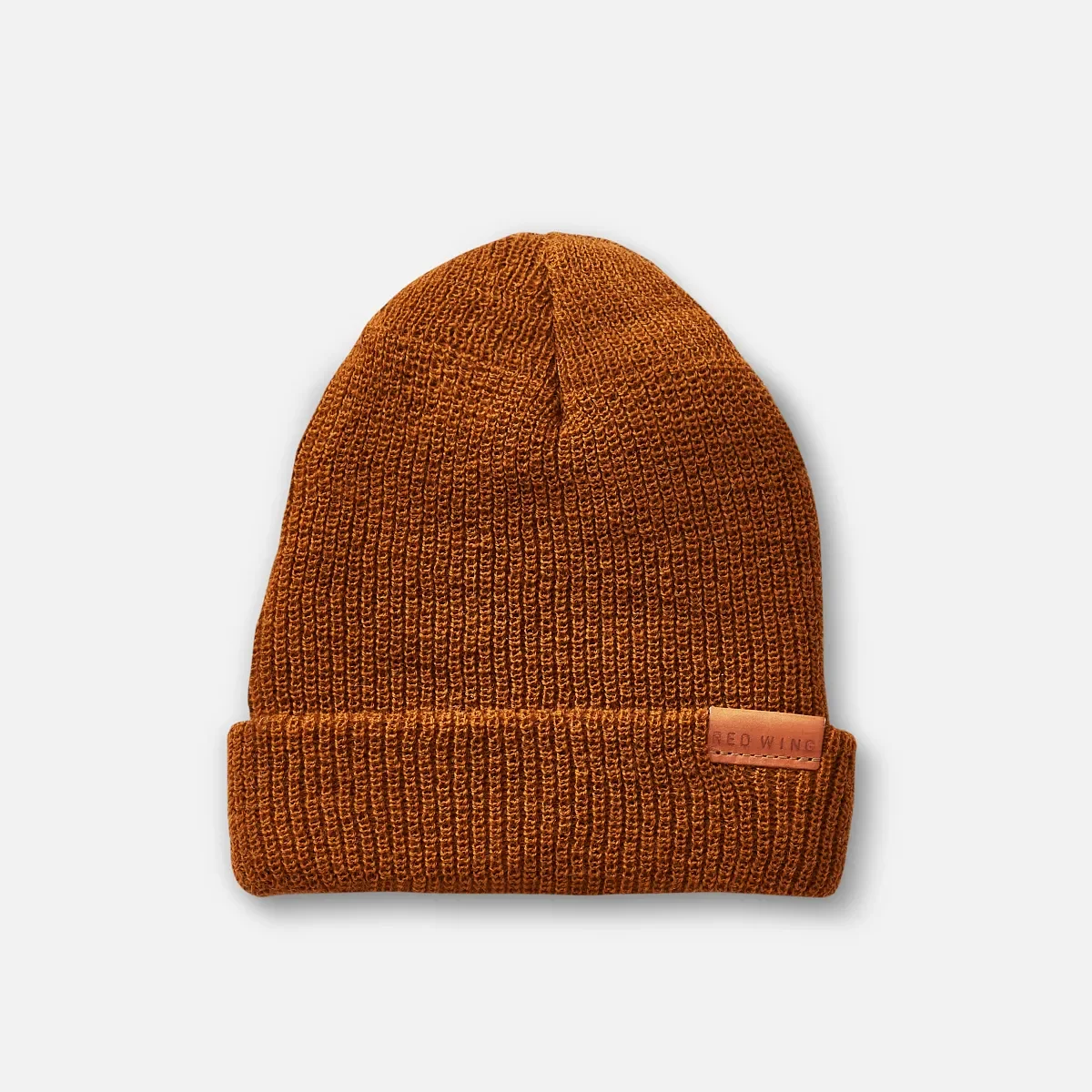 Merinoullstickad mössa Unisex-mössa i merinoull i koppar