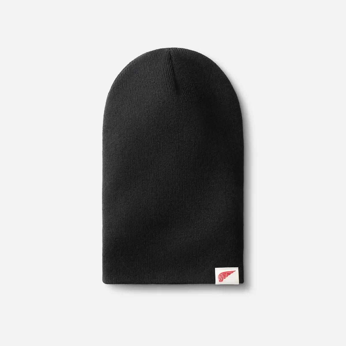 Mössa med stickad logotyp Mössa med stickad logotyp i svart