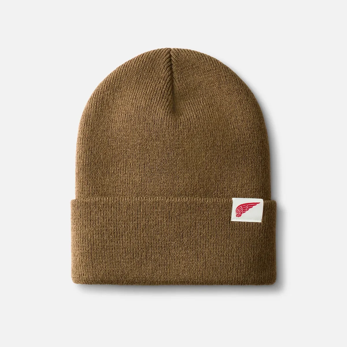 Stickad mössa med logotyp Stickad mössa med logotyp i coyotebrunt